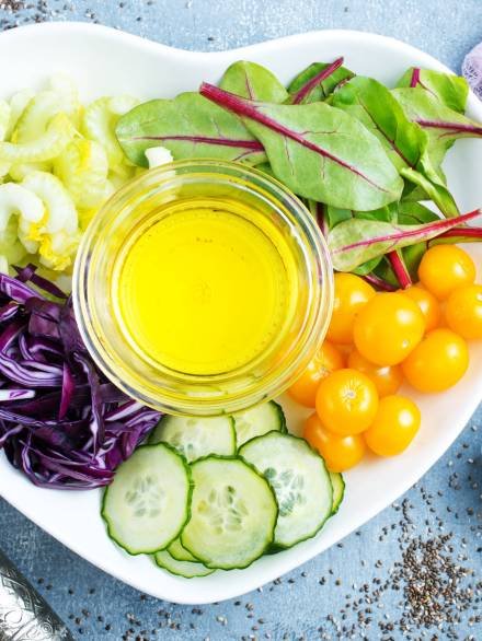 diet food, fresh vegetables and oil, ingredients for salad